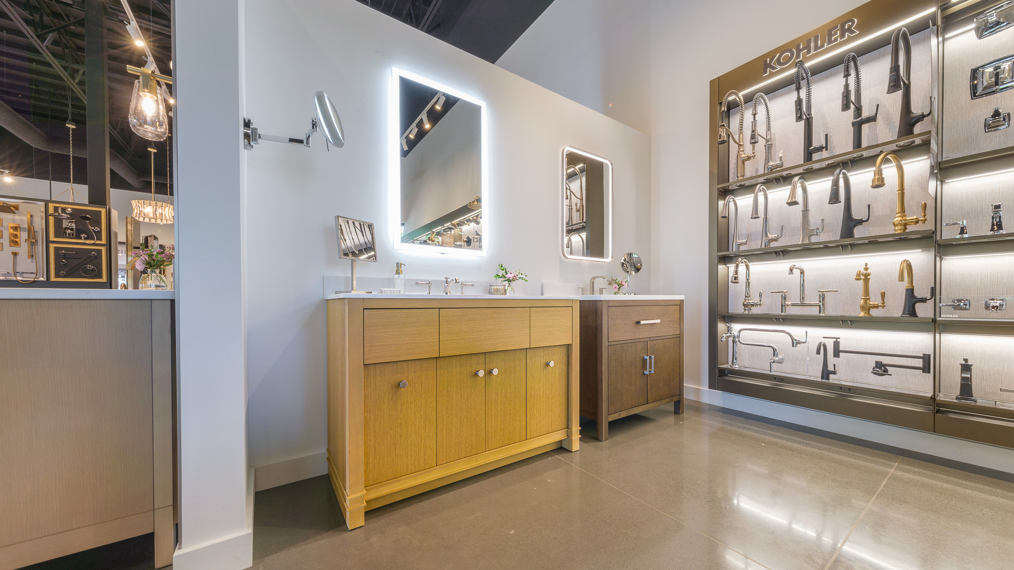 Showroom display of Kohler vanities, kitchen, bathroom, bath, mirrors, faucets, pot filler