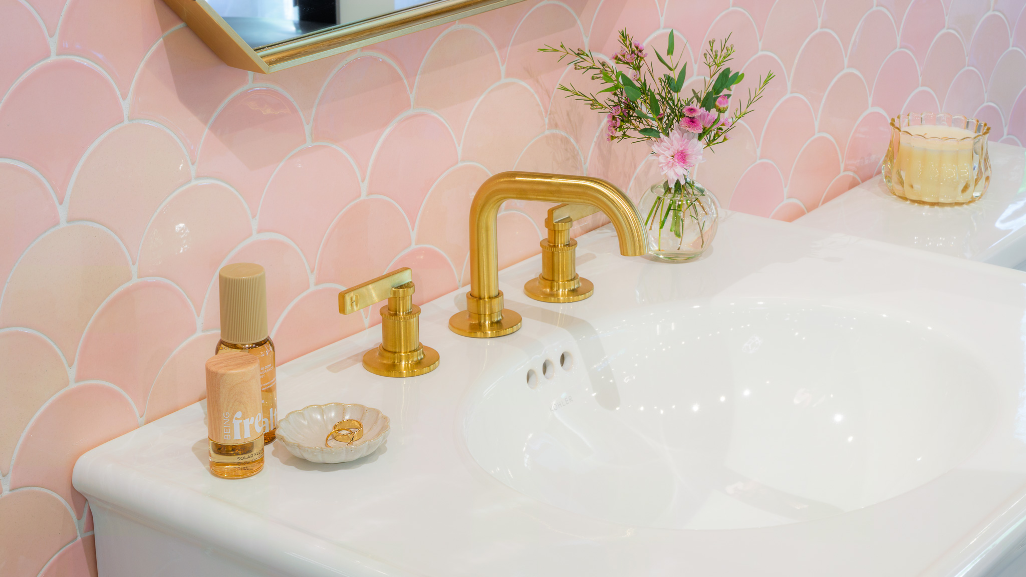 Showroom display of Kohler vanity, faucet, sink, mirror