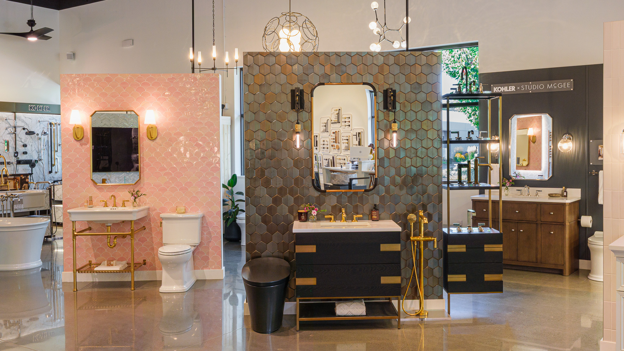 Showroom vignette displays of Kohler bathroom vanities, faucets, sinks, tub fillers, bathtub fillers, toilets, lighting, sconces, and Studio McGee